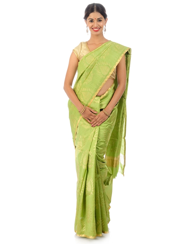 Picture of Pista Green Colored Hand Woven Cotton Shari Crafted with Lotus Art Design