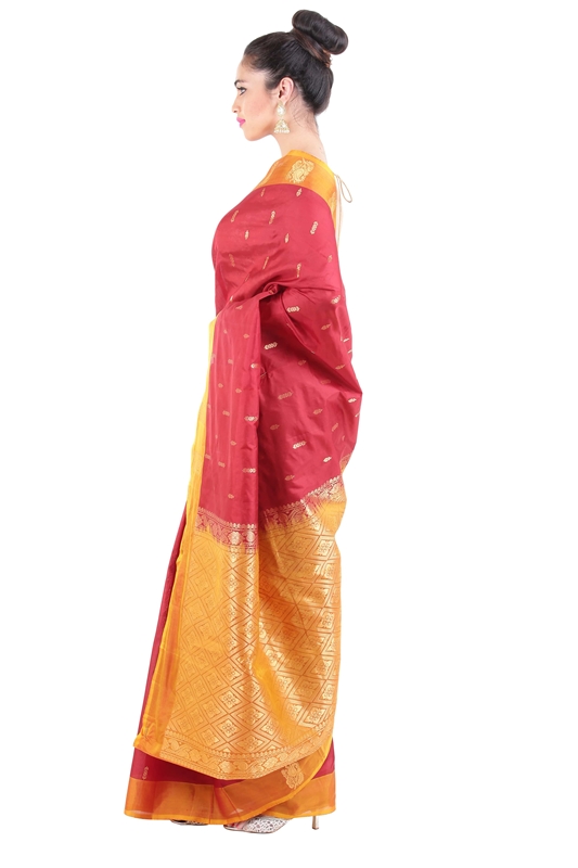 Picture of Flame Red & Yellow Dupion Silk Saree Crafted with Dotted Design Zari Border