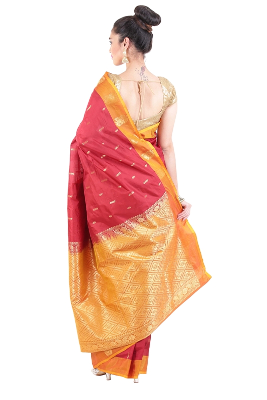 Picture of Flame Red & Yellow Dupion Silk Saree Crafted with Dotted Design Zari Border